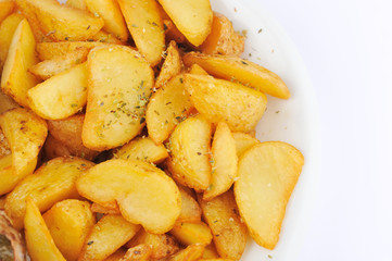 Fries food. Fries on the plate isolated on the white background.