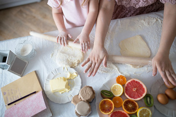 Mother Teaching Her Young Daughter To Cook