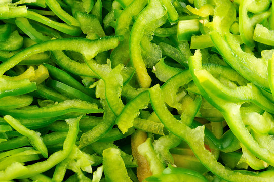 Slices of green capsicum. Green capsicum small slices wallpaper good for background.