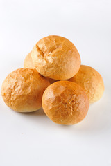Small loaf of bread. Group of easy dinner rolls isolated on the white background.