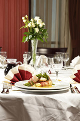 Reception table setting for a wedding event. 