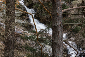 Waterfall from snow melt in the mountains of Madrid, Spain