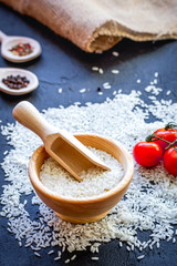 ingredients for paella on dark background