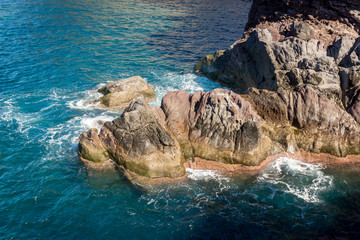Rocks on the wharf in Ponta do Sol on Madeira island, Portugal
