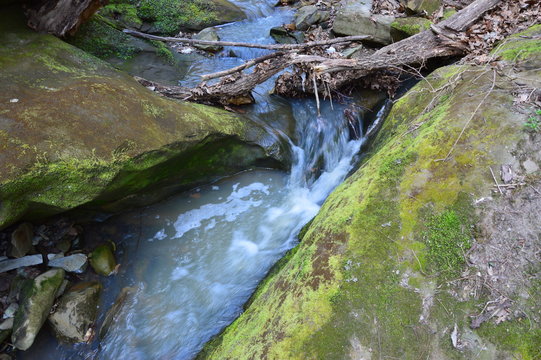 Waterfall in mossy rocks