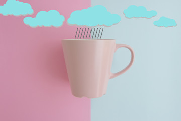 Minimal flat lay concept of pink coffee cup and drawing cloud and rain on the top on the colorful background with copy space