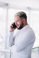 Young Businessman Talking On Phone