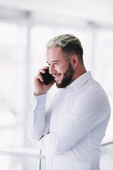 Young Businessman Talking On Phone