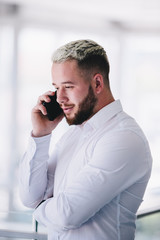 Young Businessman Talking On Phone