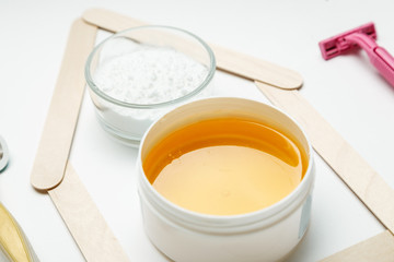 Tools for depilation on a white background