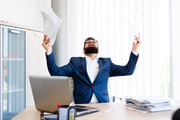 Desperate Young Banker At Workplace