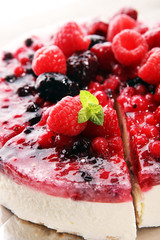raspberry cake and many fresh raspberries