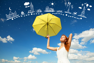 Girl with umbrella at sky background and abstract travel map in air