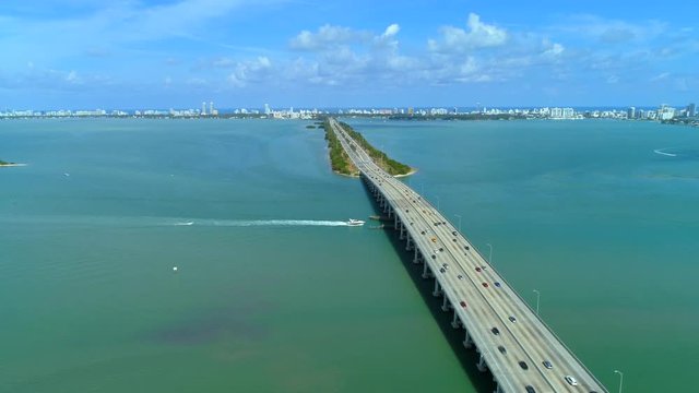 Aerial Miami Beach bridge boat bay 4k 24p