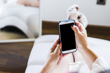 Hands using a smart phone