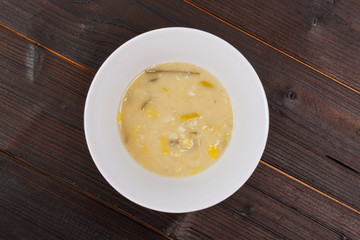 Yeasts soup with vegetables on a table