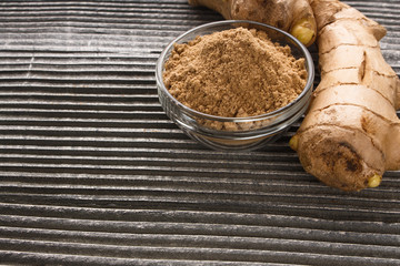 Ginger root on a gray wooden background