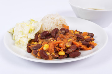 Red beans with corn and carrot, sorghum on a white