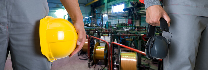 Closeup of workers in manufacturing plant