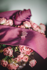 wedding аccessories for groom- pink tie and  cufflinks.