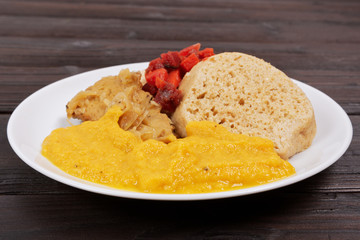 Sauce with seitan and dumplings on a table