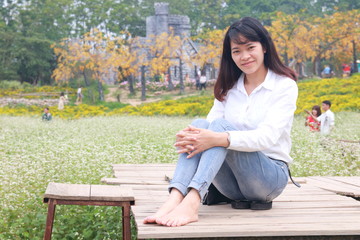 woman at the flower garden in Hanoi, Vietnam