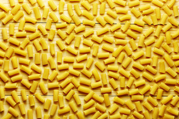 Pasta on a wood background from above