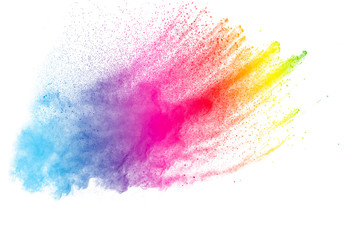 Abstract multi color powder explosion on white background.  Freeze motion of color dust  particles...