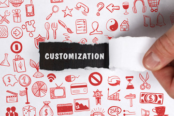The concept of business, technology, the Internet and the network. Young businessman showing inscription: Customization