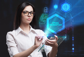 The concept of business, technology, the Internet and the network. A young entrepreneur working on a virtual screen of the future and sees the inscription: Email marketing