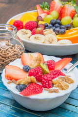 breakfast with yogurt,strawberry rasperry and cereals 