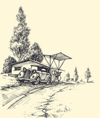 Old car parked near a small house at the edge of the road