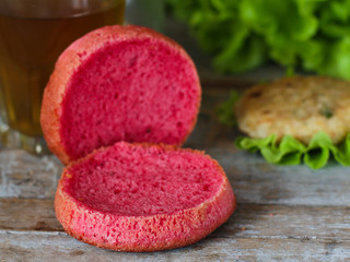 burgers pink (sandwiches) dough with beetroot juice. Beetroot buns burgers