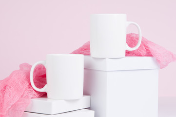 two blank white coffee mug mock ups