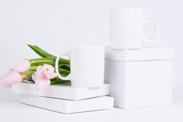 two blank white coffee mug mock ups