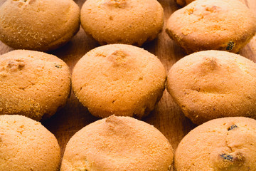 Muffins with raisins. Background