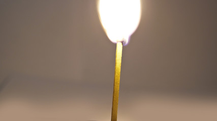 Burning wooden match