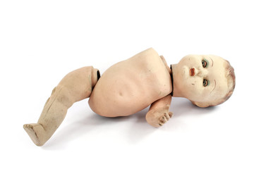 Close Up and Isolated Vintage Antique Old Doll