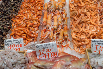 Shrimps, fish and seafood for sale at a market in Madrid, Spain