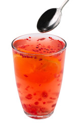 tea with raspberry and orange with metal spoon. Isolated