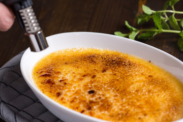 Caramelizing Creme Brulee Using a Torch