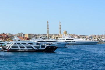 Luxury yachts docked in sea port east  panorama