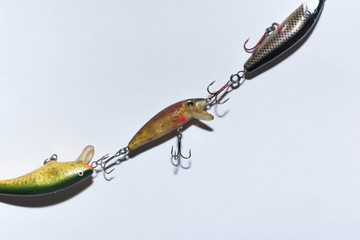 Fishing accessories, Sudak, Russia, April 26, 2018: Spoon-baiters for fishing on a white background