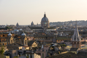 Fototapeta na wymiar view of Rome, the roofs of buildings and cathedrals