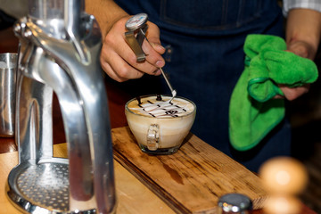 Makeing prepares coffee