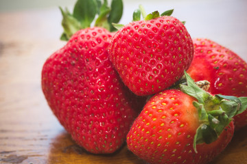 A bowl of juicy, ripe strawberries (Fragaria × ananassa)