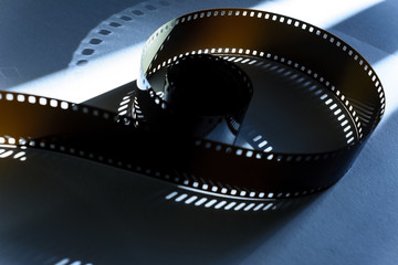 one coil of film with blue patterned shadows