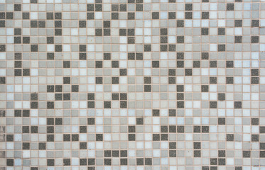 Beige and grey mosaic tiles. Mosaic background.