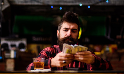 Depression and alcoholism concept. Guy spend leisure in bar,