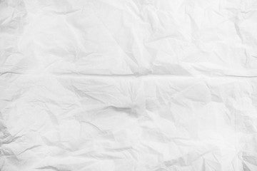 White crumpled paper texture.